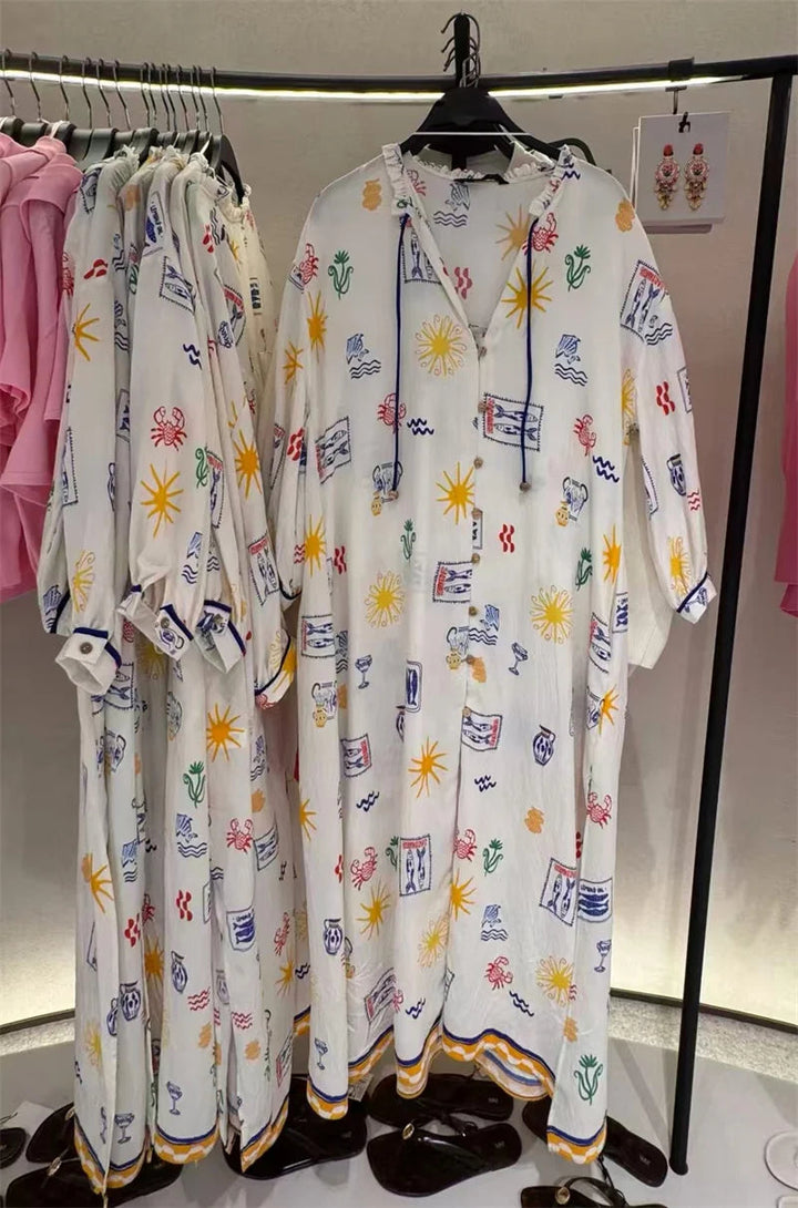 Maris – Langes Kleid mit Print und Ärmeln